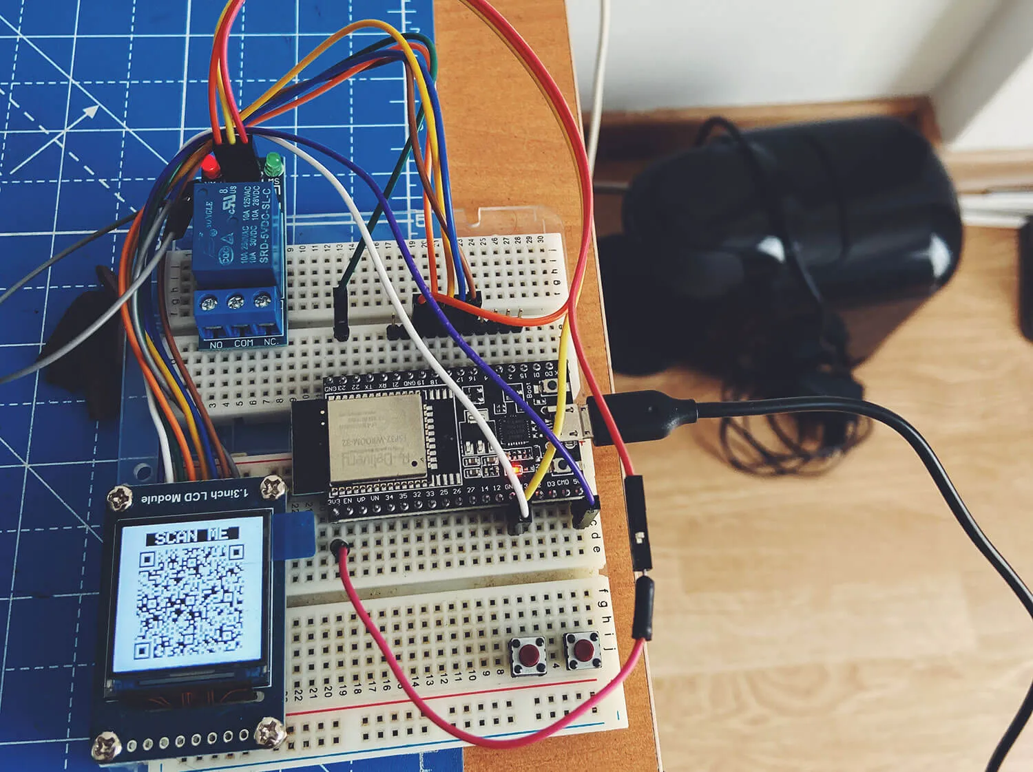 The breadboard prototype wired to a Tassimo coffee machine